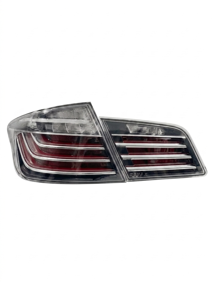 BMW 5 Series F10 BlackLine Style LED tail lights by K2 Industries, featuring sleek black finish and modern LED lighting design.