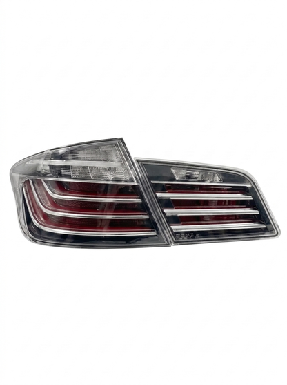 BMW 5 Series F10 BlackLine Style LED tail lights by K2 Industries, featuring sleek black finish and modern LED lighting design.