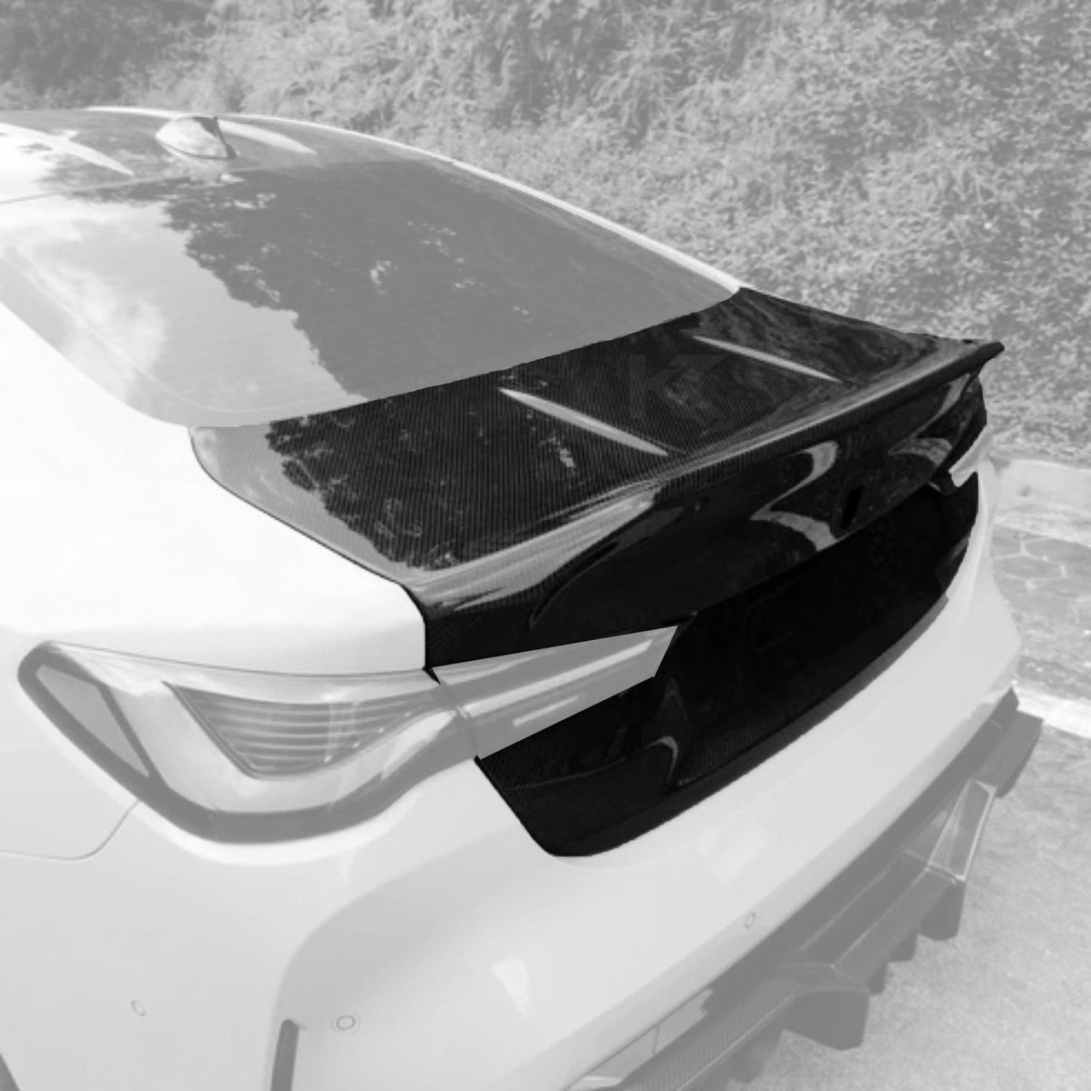 BMW 4 Series G82 carbon fiber CSL trunk by K2 Industries, showing sleek, lightweight carbon fiber trunk with aerodynamic design.
