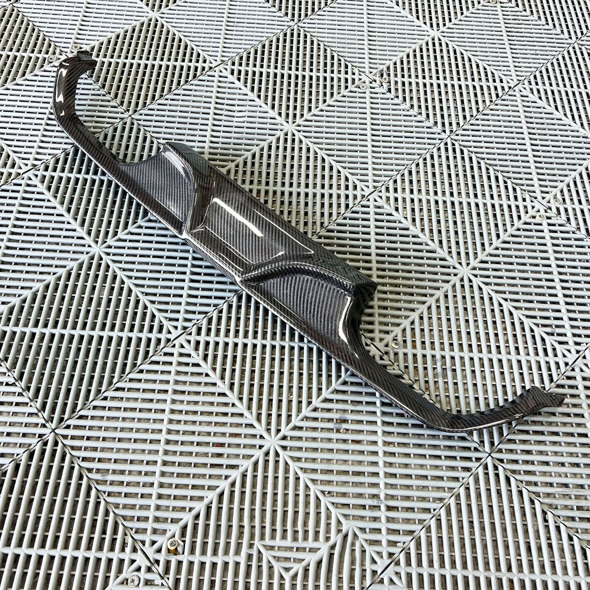 BMW 3/4 Series F80/F82/F83 carbon fiber diffuser by K2 Industries, showcasing sleek AK style design on a black car.