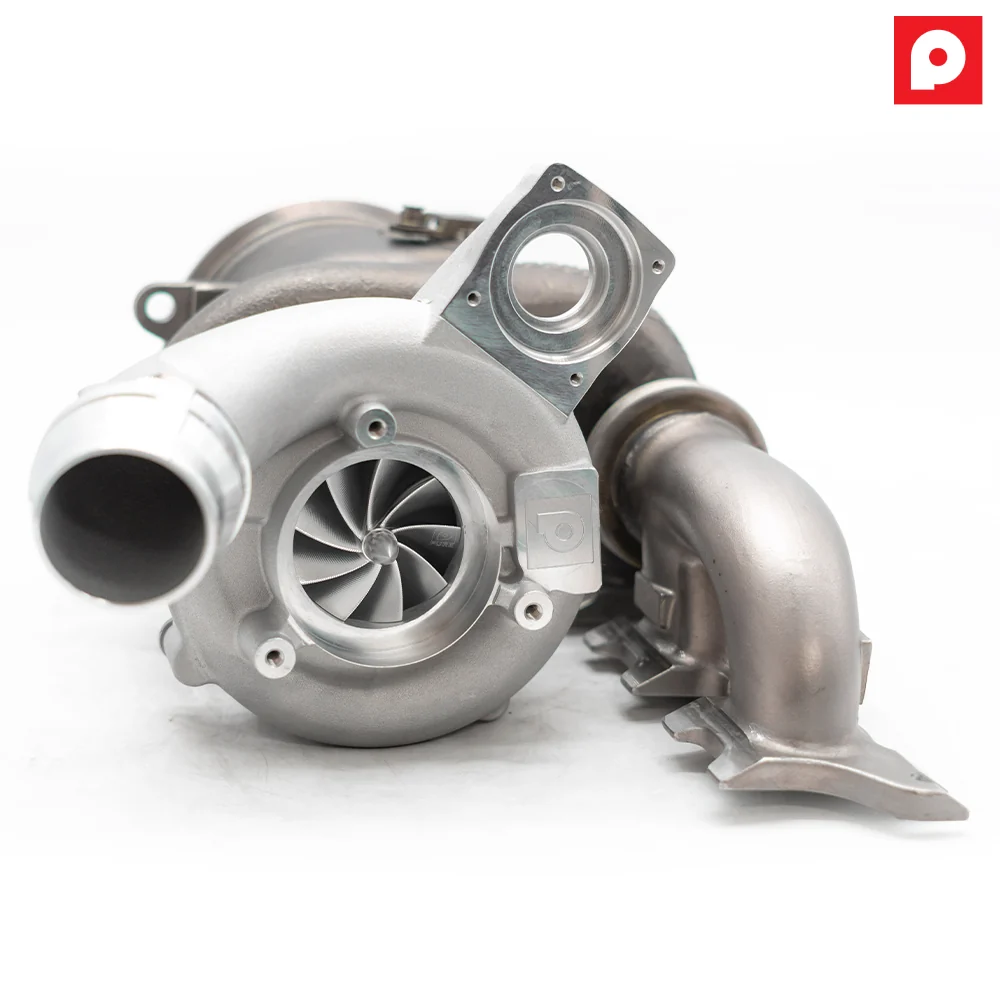 Pure650 BMW B58 Gen 2 engine tuning module by BOOTMOD3 TUNING USA, shown installed on a vehicle engine.
