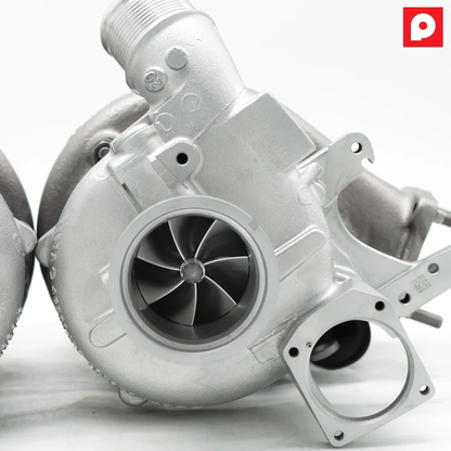 Pure1000 Porsche 992 Turbo S tuning module by BOOTMOD3 Tuning USA, shown installed in the engine bay of the sports car.