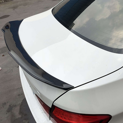 BMW E90 PSM trunk spoiler in carbon fiber, designed for 325i, 328i, and 335i models, by Palenon Performance.