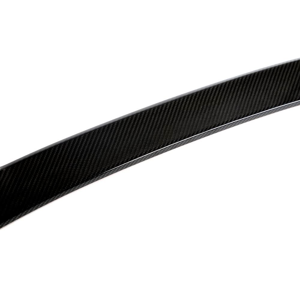 BMW F30 F35 F80 M3 carbon fiber rear trunk spoiler by K2 Industries, showcasing sleek dry carbon fiber design on a 3 Series or M3.