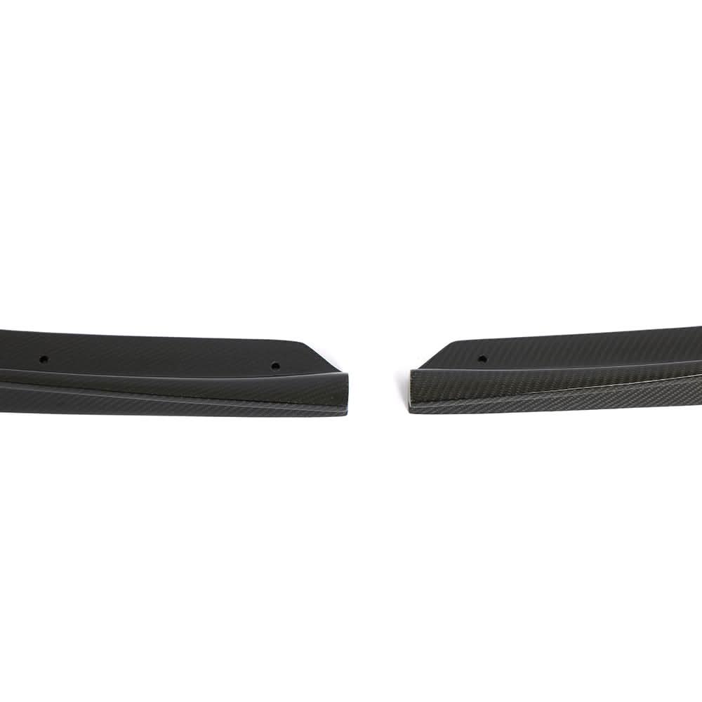 Gloss carbon fiber front splitter for BMW F80 M3 and F82 M4 from K2 Industries, designed for aerodynamic performance.