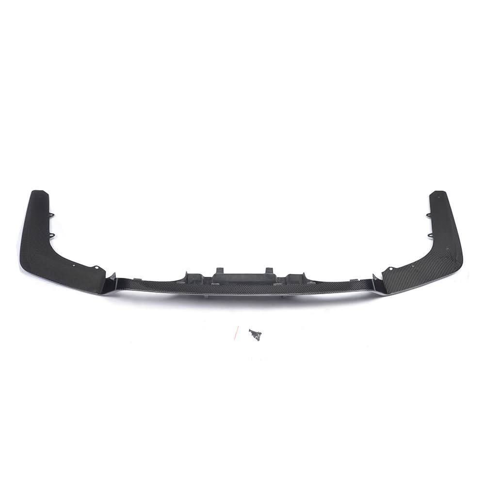 Carbon fiber rear diffuser for BMW F80 M3 and F82 M4, with quad exhaust cutouts, designed for performance and aerodynamics.