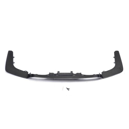 Carbon fiber rear diffuser for BMW F80 M3 and F82 M4, with quad exhaust cutouts, designed for performance and aerodynamics.