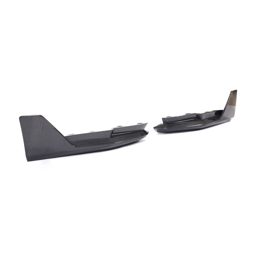 Pair of dry carbon fiber front splitter winglets for BMW G80 M3 and G82/G83 M4 Competition by K2 Industries, showcasing sleek aerodynamic design.