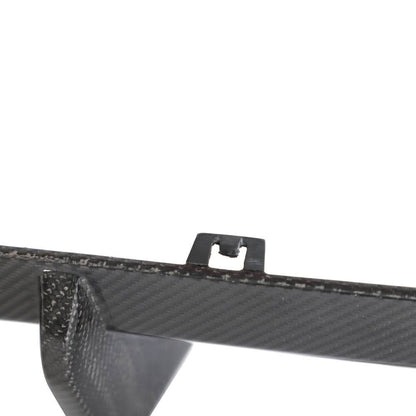 Carbon fiber rear diffuser lip for BMW M2 G87 coupe by K2 Industries, showing the sleek, textured carbon fiber surface.