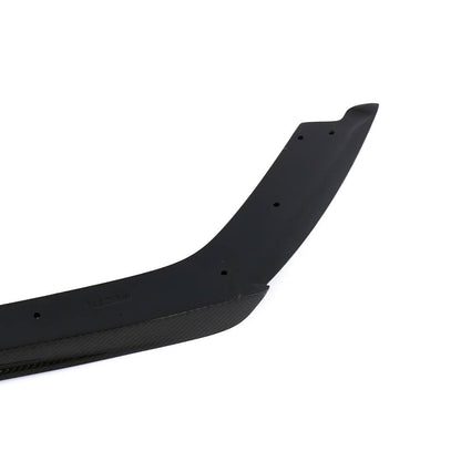 Gloss carbon fiber front splitter for BMW F80 M3 and F82 F83 M4, featuring aerodynamic design and performance style.