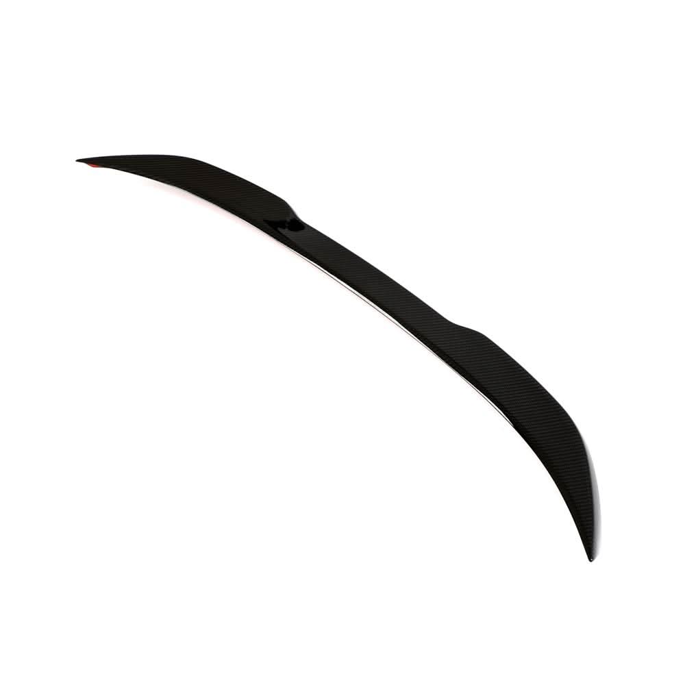 Dry carbon fiber rear trunk spoiler for BMW F30, F35 3 Series and F80 M3 by K2 Industries, showing sleek, textured finish on vehicle.