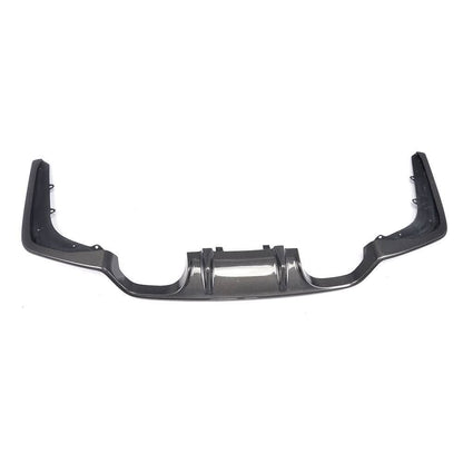 Performance carbon fiber rear diffuser for BMW F80 M3 and F82 F83 M4 with quad exhaust, designed for aerodynamic enhancement.
