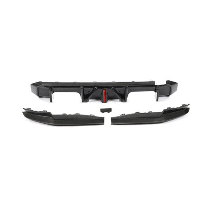 Dry carbon fiber rear diffuser for BMW G80 M3 and G82 G83 M4 Competition, showing sleek carbon fiber finish and aerodynamic design.