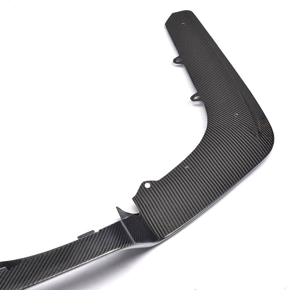 Carbon fiber rear diffuser for BMW F80 M3 and F82 M4 with quad exhaust, designed for improved aerodynamics and sporty look.