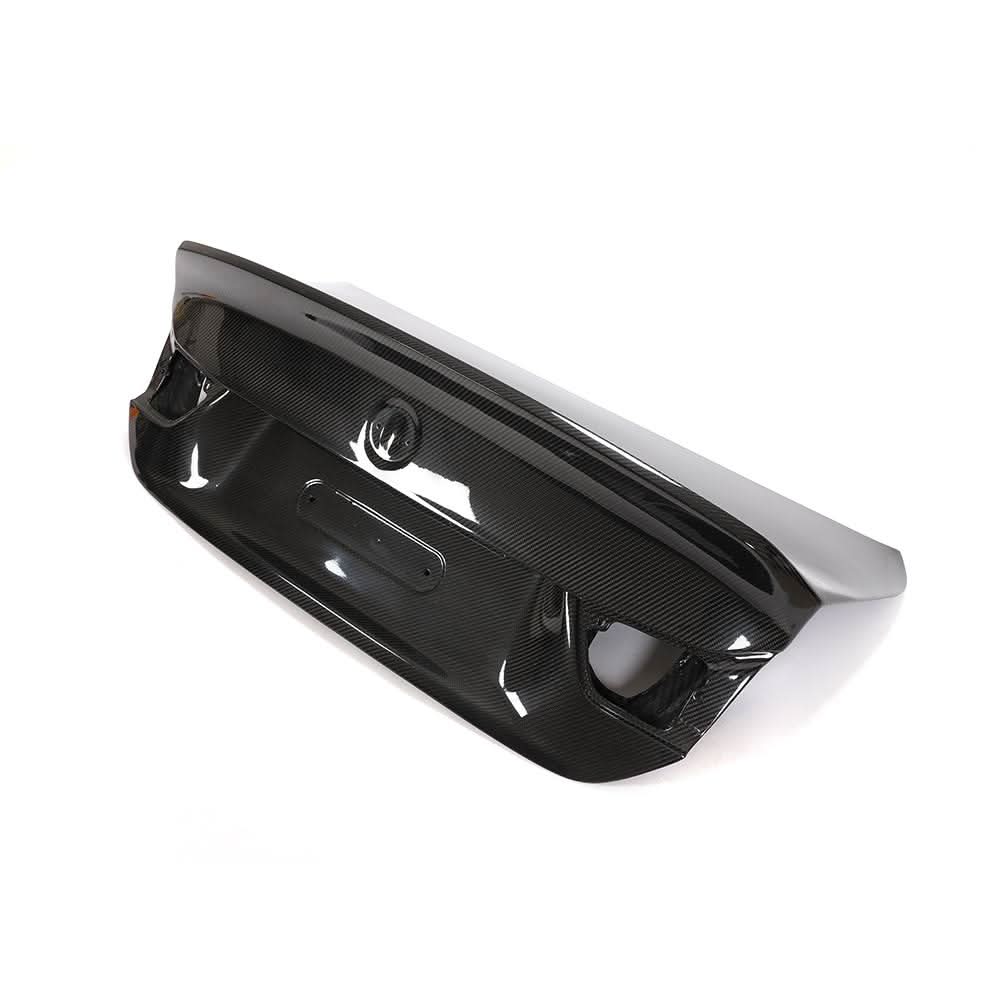 Carbon fiber performance trunk lid with high ducktail for BMW F32 4-Series and F82 M4 Coupe by K2 Industries, front view.