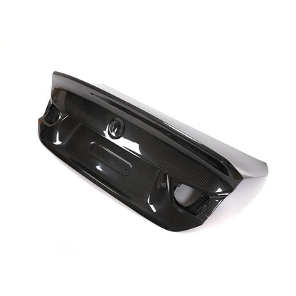 Carbon fiber performance trunk lid with high ducktail for BMW F32 4-Series and F82 M4 Coupe by K2 Industries, front view.