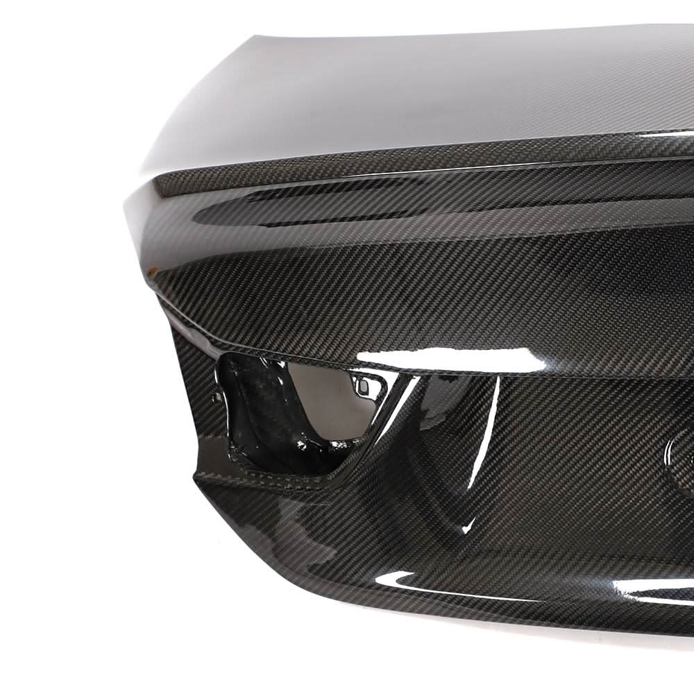 K2 Industries carbon fiber trunk lid with high ducktail for BMW F32 4-Series and F82 M4 Coupe 2014-2020.