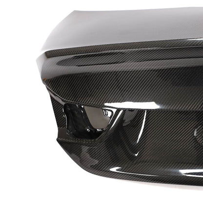 K2 Industries carbon fiber trunk lid with high ducktail for BMW F32 4-Series and F82 M4 Coupe 2014-2020.