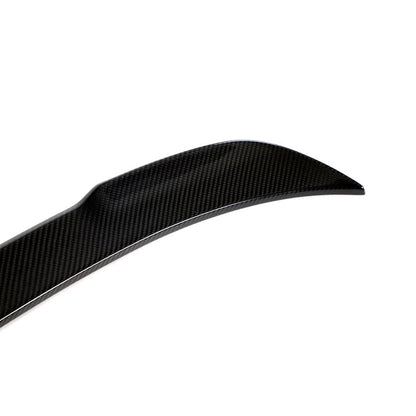 Dry carbon fiber rear trunk spoiler for BMW F30/F35 3 Series and F80 M3, showcasing sleek, lightweight racing-inspired design.