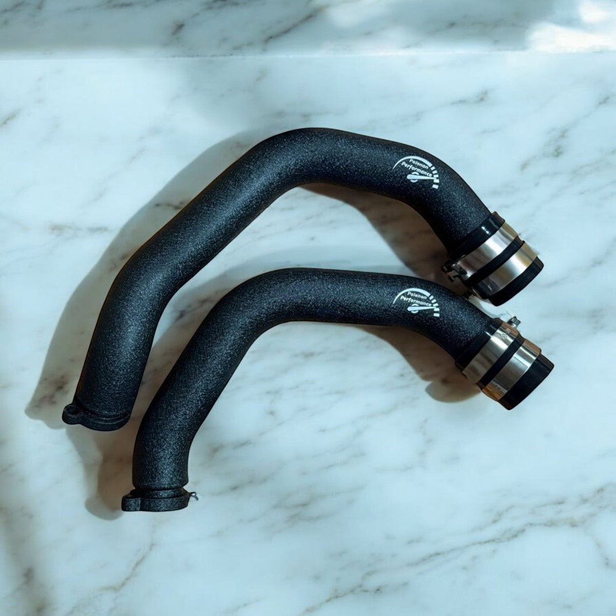 Aluminum Palenon Performance charge pipe upgrade for BMW F87 M2C, F80 M3, and F82 M4, showing sleek metal construction.
