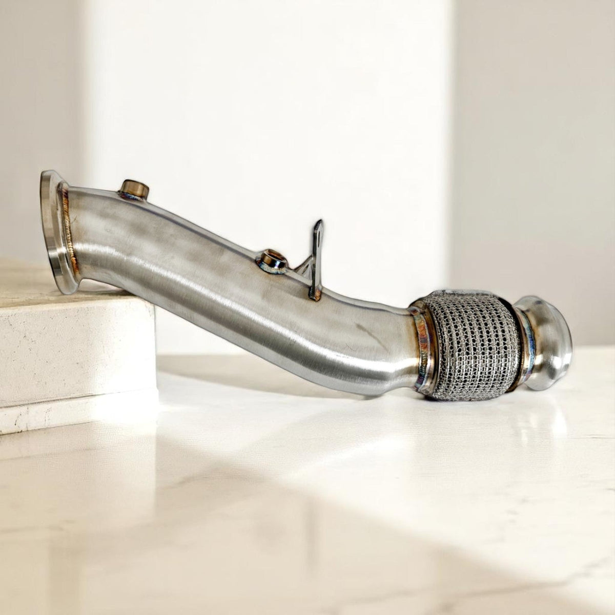 Palenon Performance B46 B48 Racing Downpipe for Supra 2.0T and BMW G/F chassis models, shown with metallic finish and custom welds.