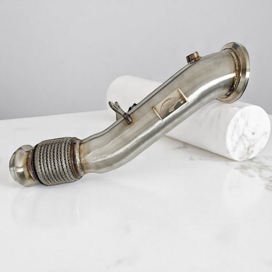 Palenon Performance B46 B48 Racing Downpipe for BMW and Toyota Supra, showing the polished metal pipe with mounting flanges.