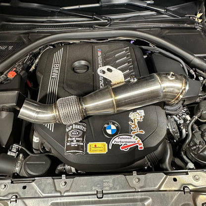 Palenon Performance B58 Racing Downpipe for BMW and Supra, showing the metallic downpipe with logo and mounting flanges.
