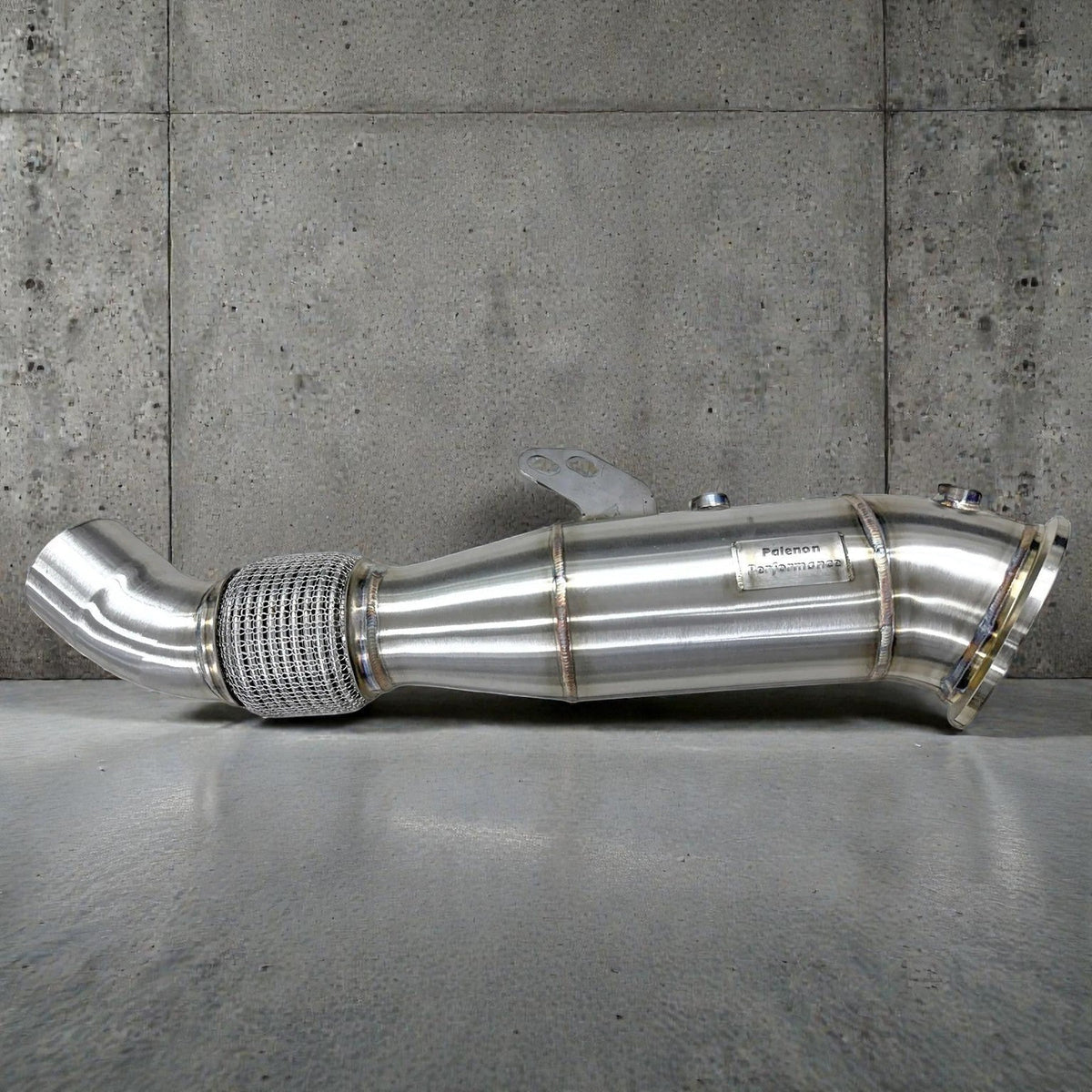 Palenon Performance B58 stainless steel racing downpipe for BMW M340i, M440i, X5, X7 with sleek exhaust design and branding details.