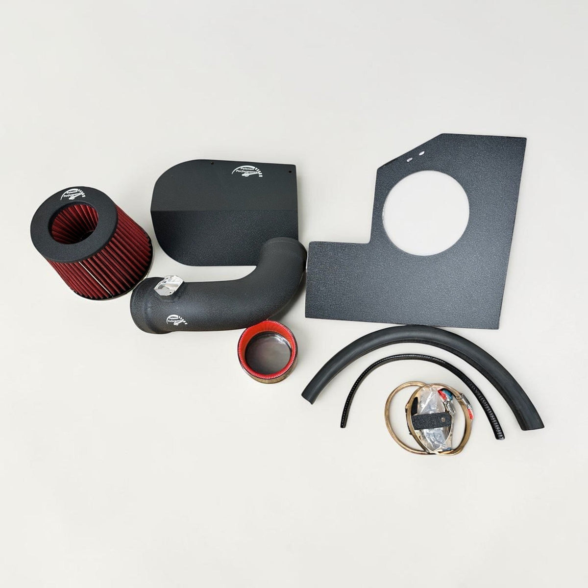 Palenon Performance cold air intake for BMW B48 and B46 engines, installed in a BMW 230i or 330i vehicle, showcasing the sleek design.
