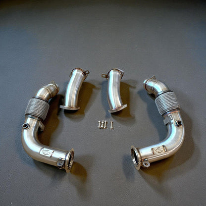 Palenon Performance S68 racing downpipes for BMW G90 G99 M5 showing polished stainless steel pipes with flanges