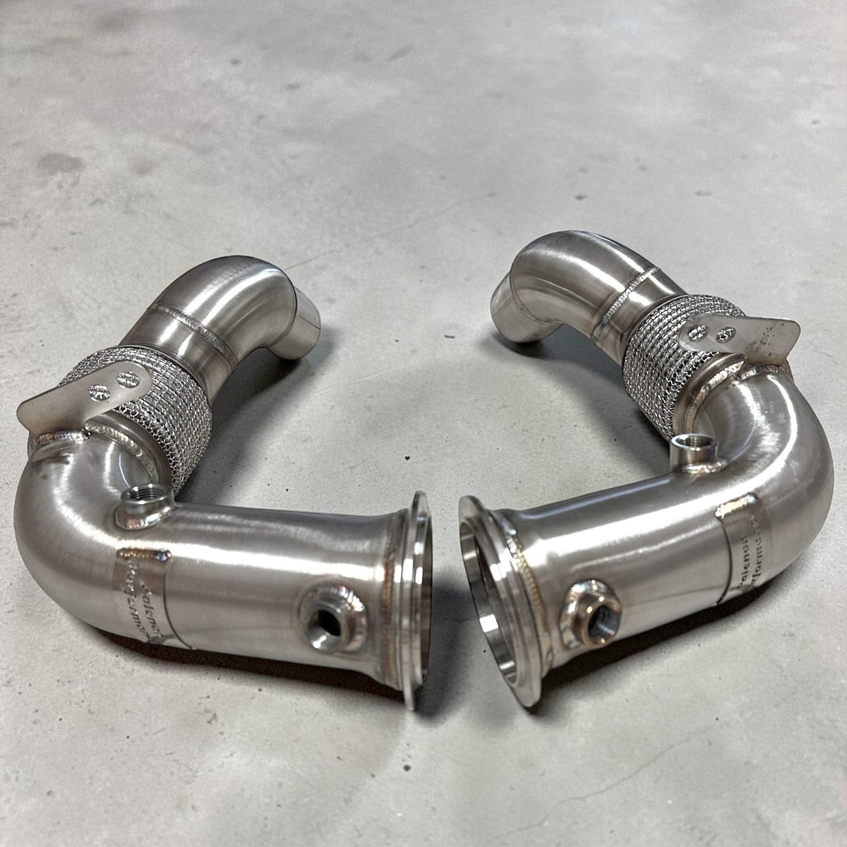 Palenon Performance BMW S63 downpipe for F10 M5, F12, F06, F13 M6 including Competition, showcasing high-performance exhaust component.