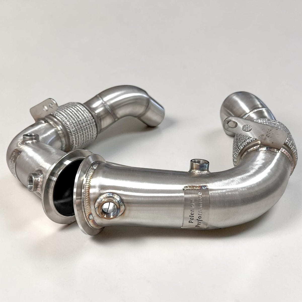 Palenon Performance stainless steel Race Downpipe for BMW F10 M5, F12 M6, F06, F13 M6 with S63 engine, showing polished pipe and flanges.