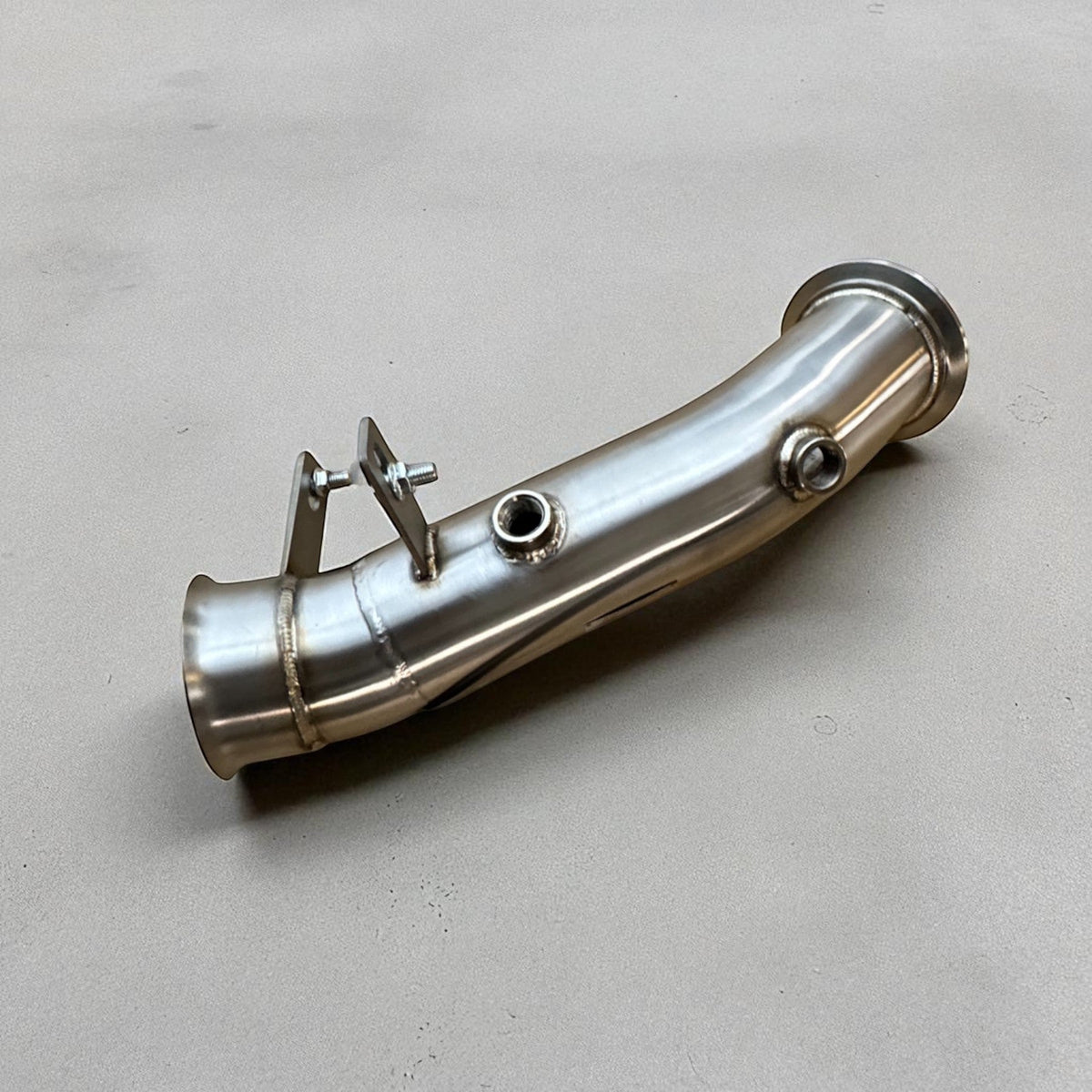 Palenon Performance N55 racing downpipe in stainless steel for BMW 335i, 435i, M2, M135i, and M235i models.