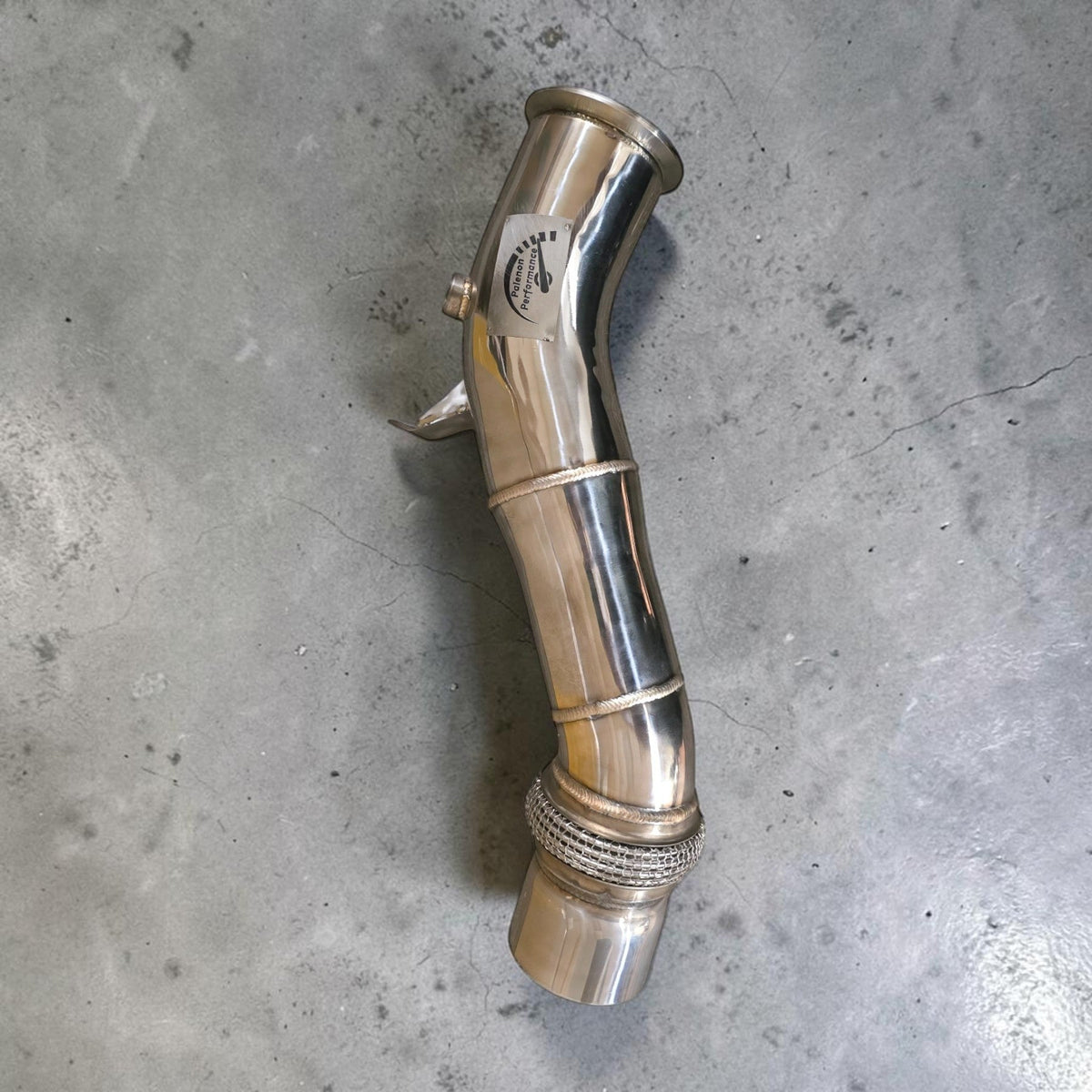 Stainless steel N55 downpipe for BMW 535i, 640i, 740i, X5, X6 by Palenon Performance, showcasing the polished exhaust component.