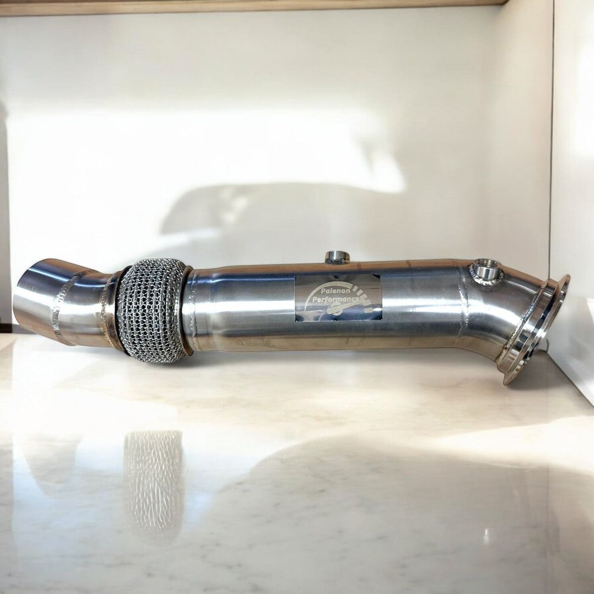 Palenon Performance stainless steel N55 downpipe for BMW 535i, 640i, 740i, X5, X6 F chassis, showing polished metal and flanges.