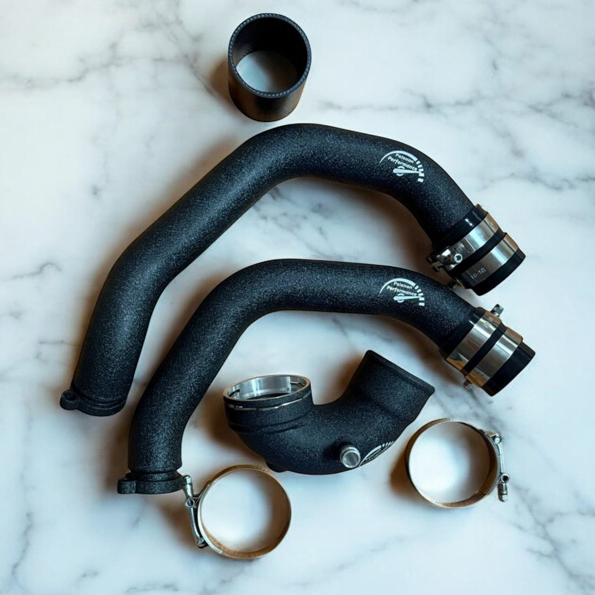 Aluminum S55 charge pipe upgrade by Palenon Performance for BMW F87 M2C, F80 M3, and F82 M4, showcasing sleek metal design.