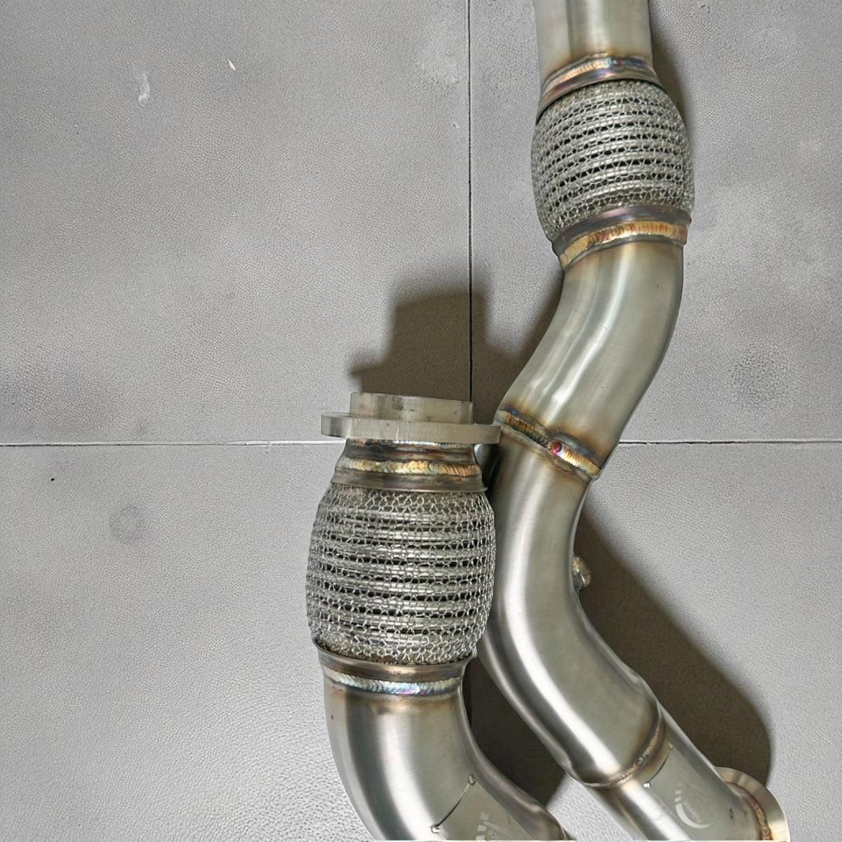 Palenon Performance S55 Racing Downpipe installed on BMW F80 M3, F82 M4, and F87 M2, showing the high-performance exhaust component.