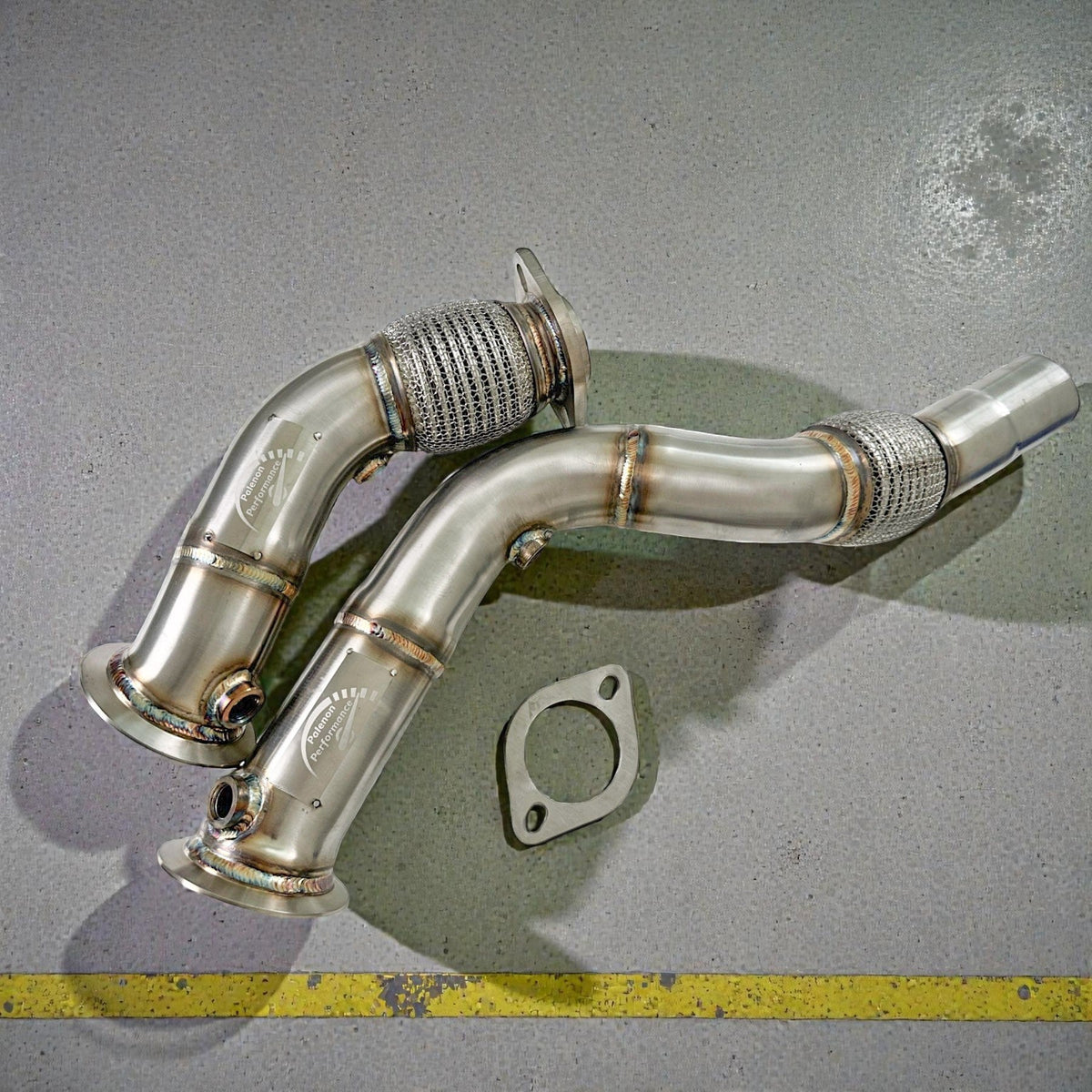 Palenon Performance S55 Racing Downpipe for BMW F80 M3, F82 M4, F87 M2, showing the high-performance exhaust component.