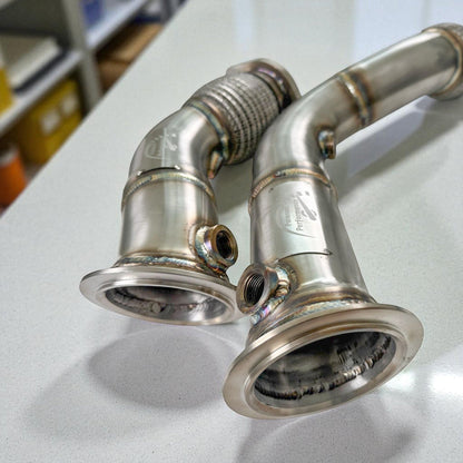 Palenon Performance S55 Racing Downpipe for BMW F80 M3, F82 M4, F87 M2, showing polished metal construction and exhaust flange details.
