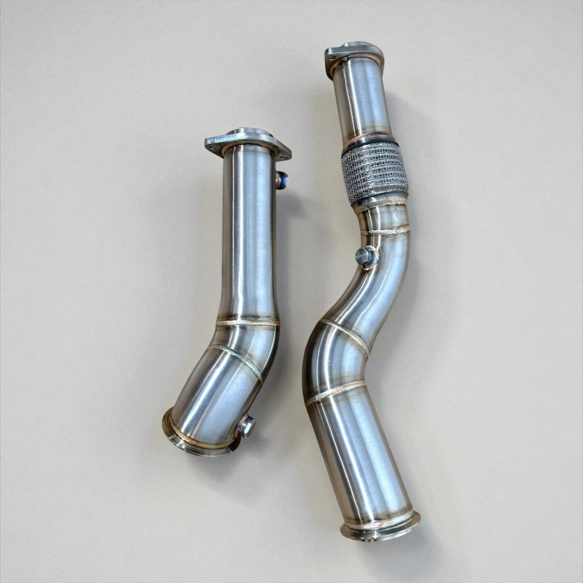 Palenon Performance S58 stainless steel race downpipe for BMW M3 G80, M2 G87, M4 G82 G83, showing polished metal piping and fittings