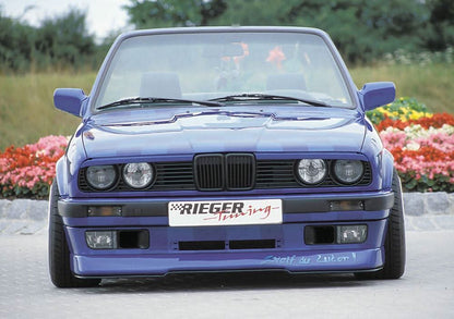 K2 Industries BMW E30 Facelift front lip spoiler, sleek black front lip for BMW E30 model, enhances sporty appearance.