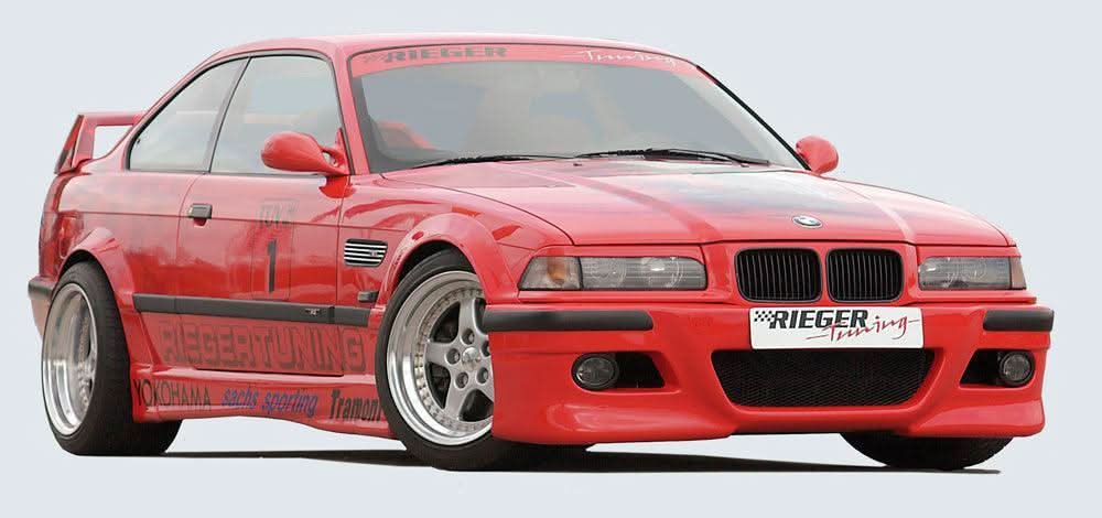 K2 Industries Rieger BMW E36 coupe and convertible side skirts V2 installed on vehicle, showcasing sleek automotive styling.