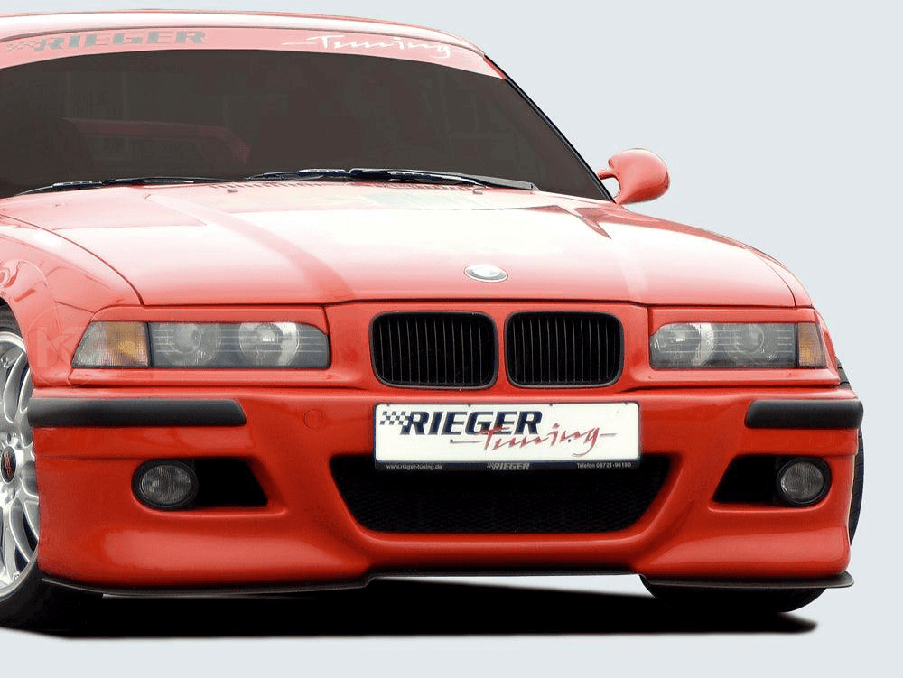 K2 Industries BMW E36 front bumper in E46 style, shown in black with grille openings and mounting areas.