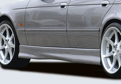 K2 Industries Rieger BMW E39 Side Skirts V2 installed on a BMW E39 sedan, showcasing sleek aerodynamic design and side panel details.
