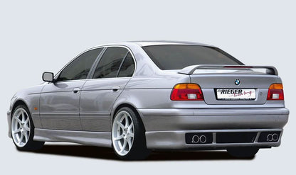 K2 Industries Rieger BMW E39 Side Skirts V2 installed on a vehicle, showcasing sleek, aerodynamic side skirts for BMW E39 model.