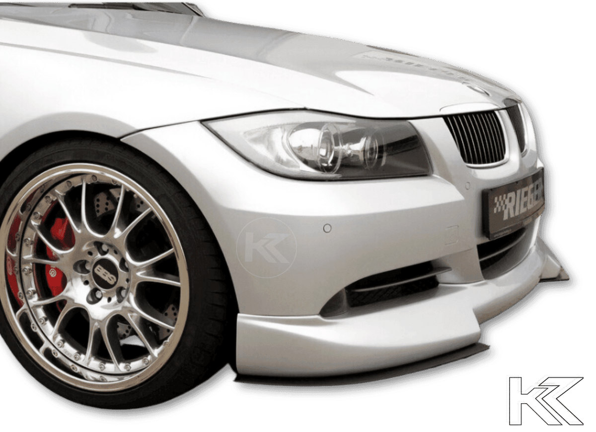 K2 Industries BMW E90/E91 front splitter attached to Rieger front lip, enhancing the car's sporty look and aerodynamic performance.