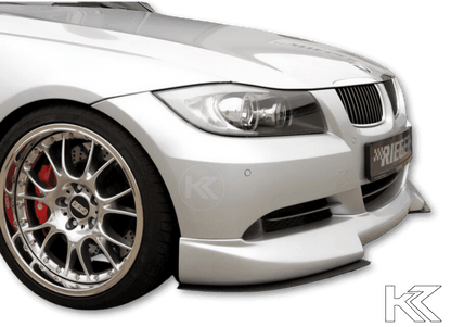 K2 Industries BMW E90/E91 front splitter attached to Rieger front lip, enhancing the car's sporty look and aerodynamic performance.