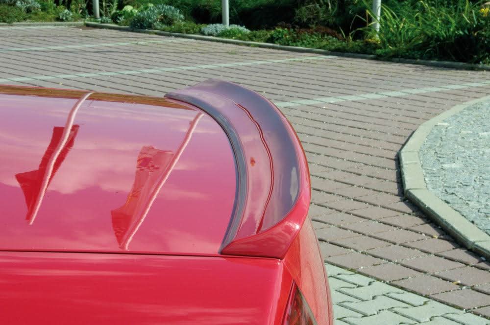 K2 Industries VW Passat 3B rear lip spoiler mounted on the car's rear, enhancing aerodynamics and sporty appearance.