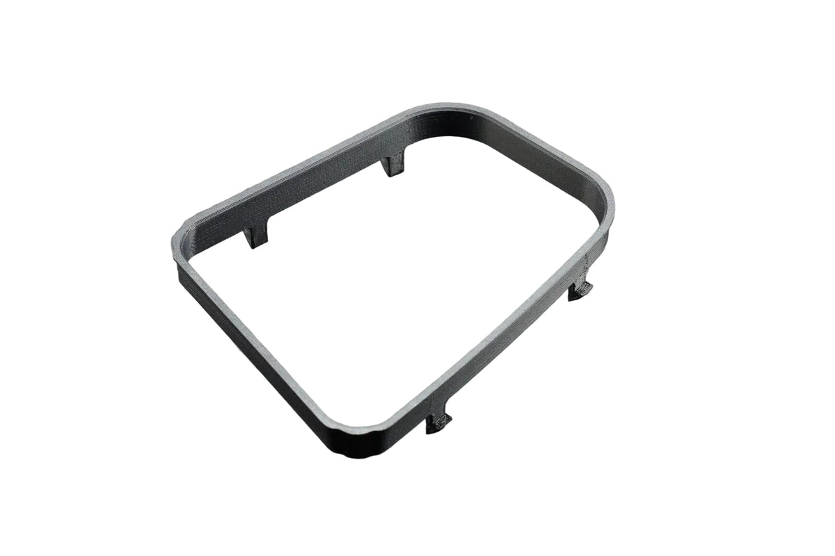 Plastic shift boot frame for 1999-2005 BMW E46 manual transmission, designed by JTS Custom Upholstery, shown on a vehicle.