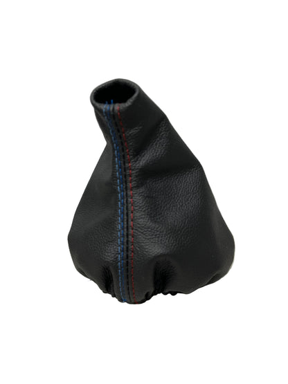 Leather console shift and parking brake boot cover for BMW E46, custom upholstered with M stitching by JTS.